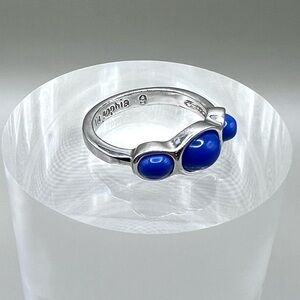 EUC lia sophia “Adieu" ring, Sz 9, silver tone with blue resin. Gently worn